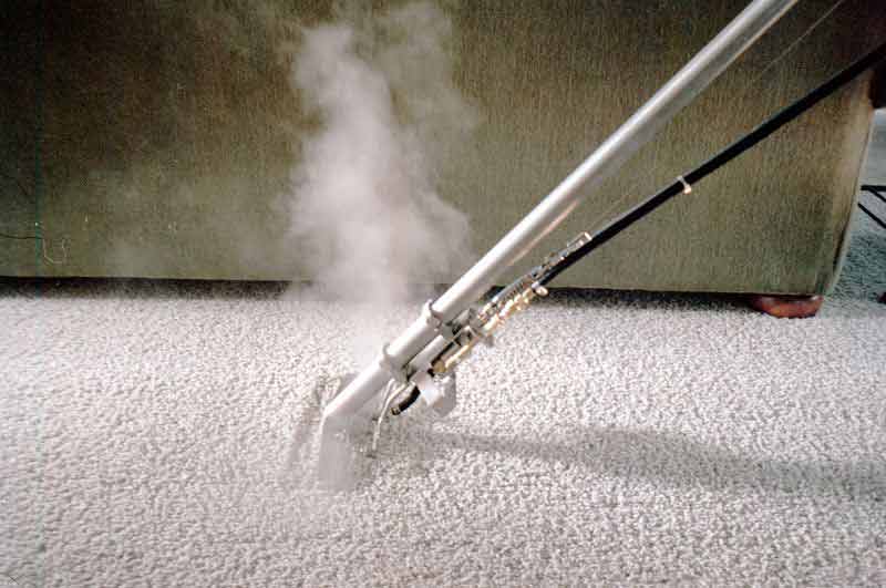 Professional extraction cleaning of carpet or upholstery as part of Cape Town spring deep cleaning